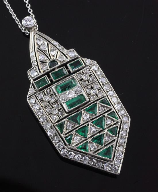 A 1930s/1940s Art Deco white gold, emerald and diamond pendant, pendant 1.75in.